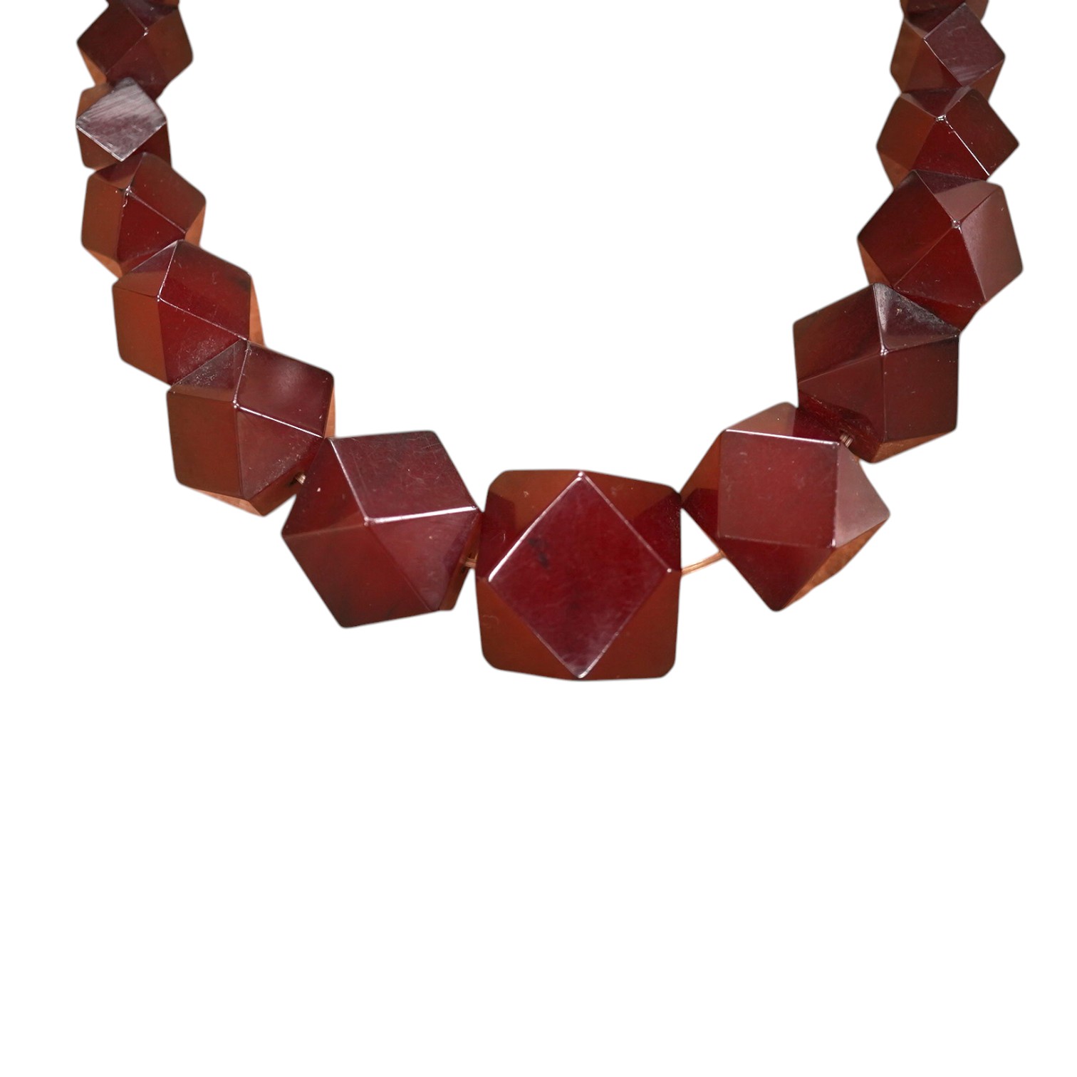 A single strand part facetted simulated cherry amber and part facet paste set necklace, (approx. 30 of the smallest beads are paste), 68cm, gross weight 84 grams. Condition - fair to good